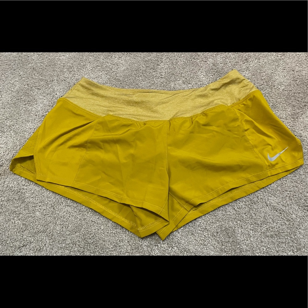 Yellow Nike Dri-Fit running shorts, in Medium